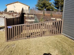 brown vinyl fencing, 4' closed picket fence and 6' solid privacy fence