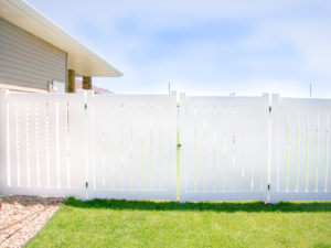 4' white vinyl semi-private fence with double swing gate