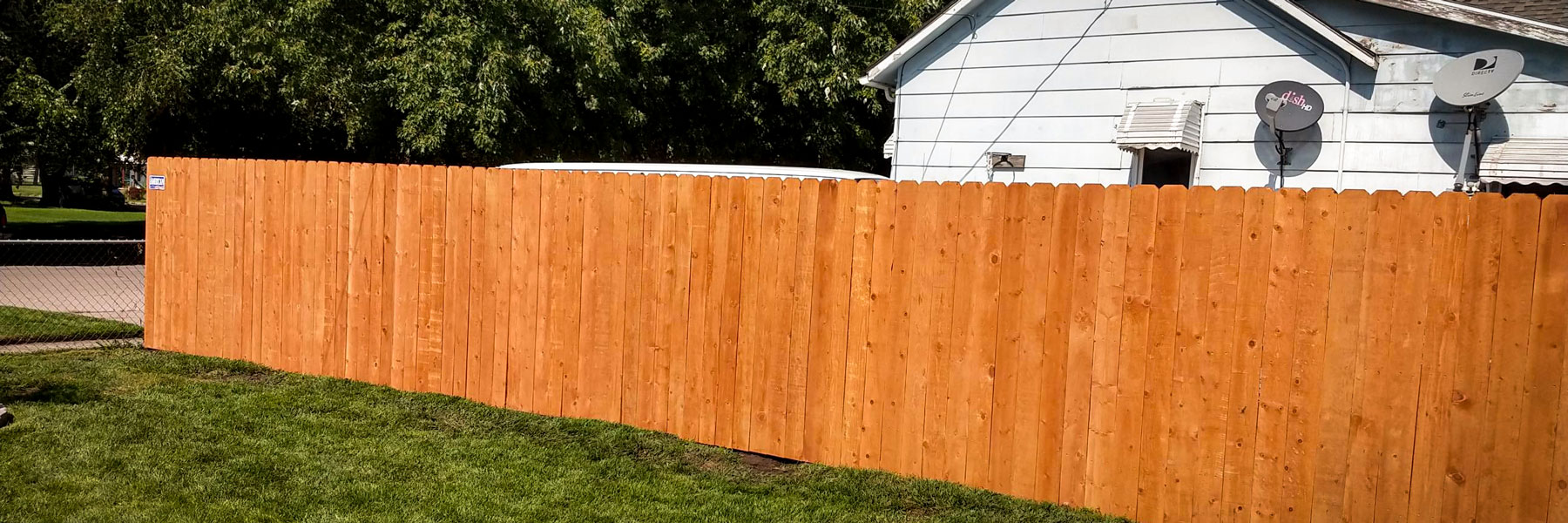Grand Island fence company residential fencing contractors Nebraska wood fencing cedar western red cedar treated pine white red yellow CCA  ACQ2 incense fir 2x4 1x6 2" x 4"  1" x 6"  nails stain solid privacy picket scalloped board on board shadow box pickets rails posts installation panels post caps modern horizontal backyard front yard ranch gate garden diy split rail house lattice old rustic vertical metal post picket dog ear contemporary custom 